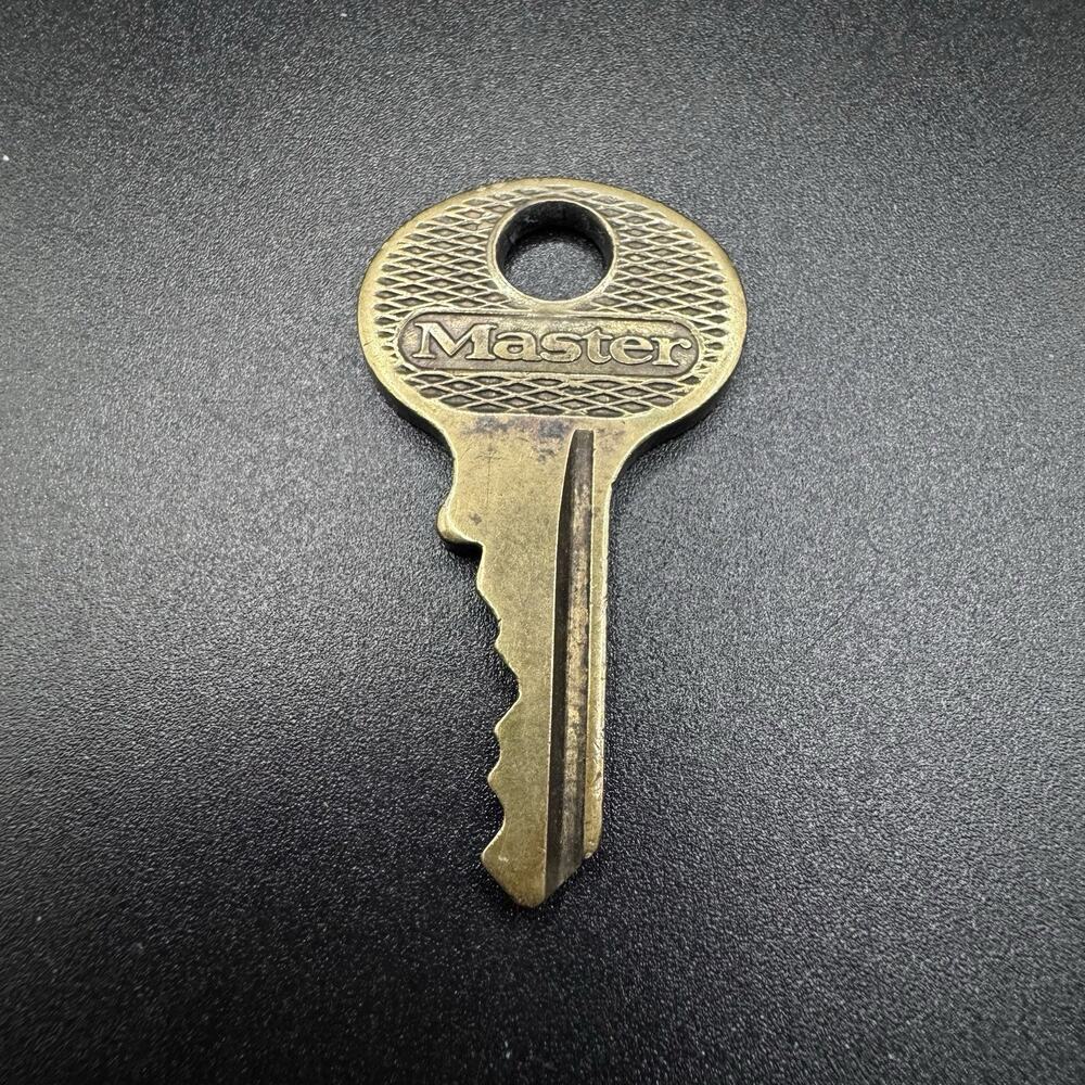 Vintage Oval Master Lock Co Key Milwaukee #A387 Original Brass Used